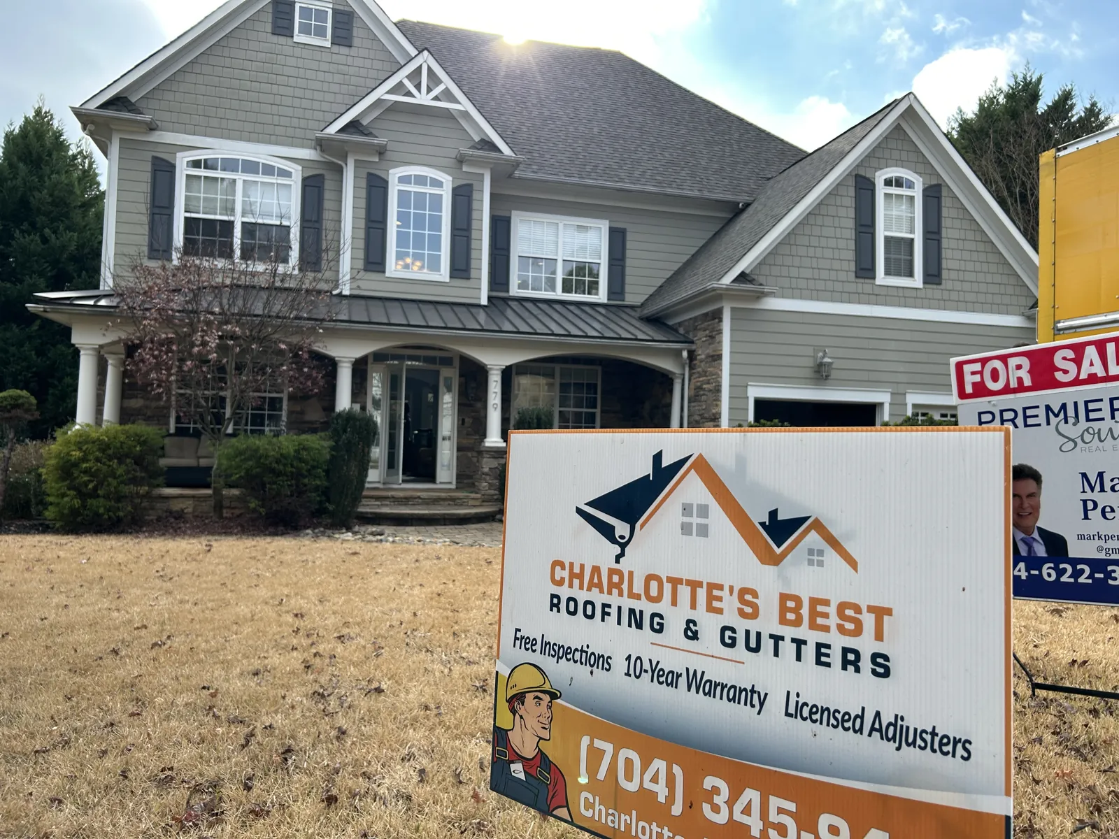 Tega cay SC two story new roof yard sign